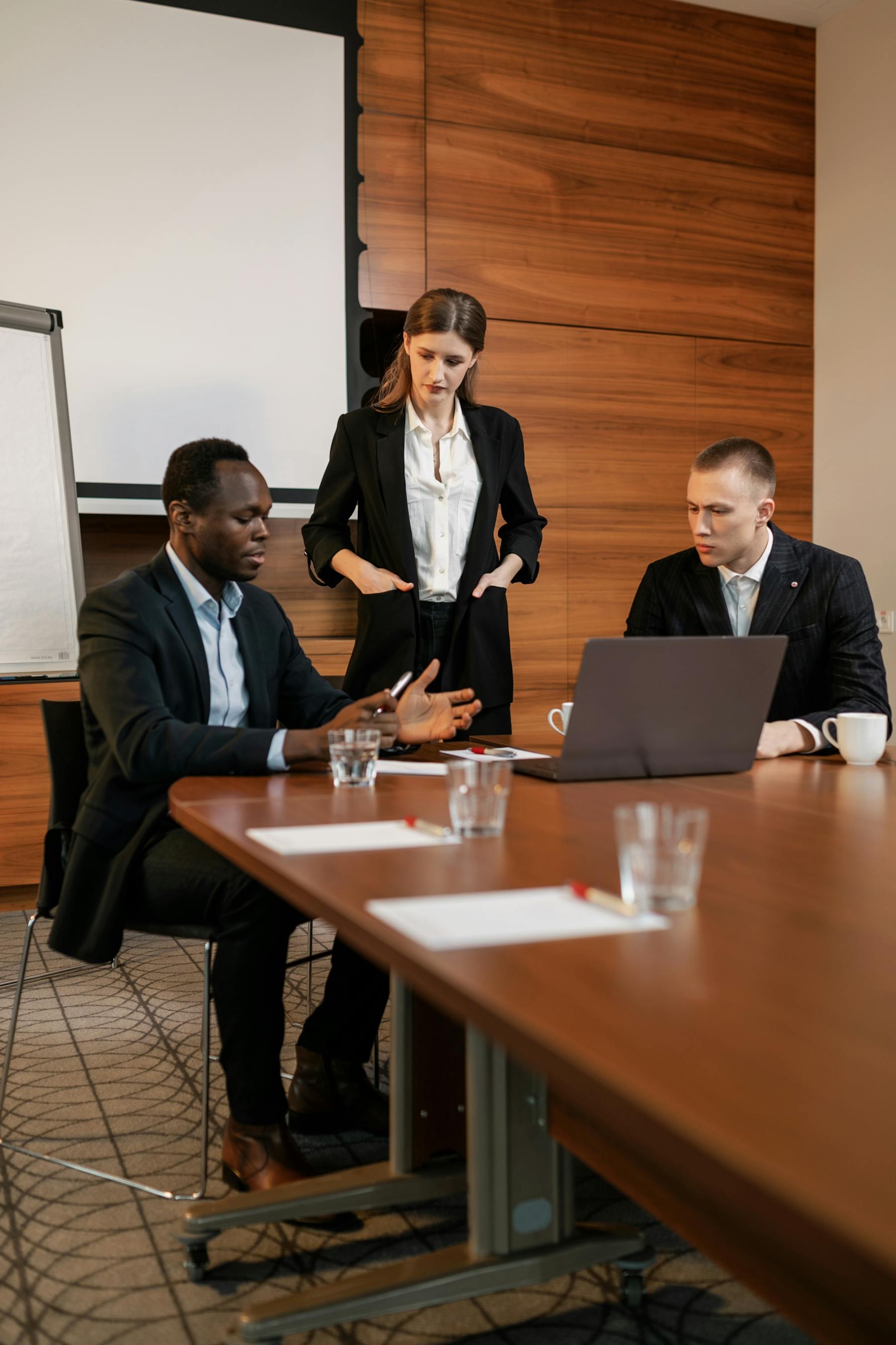Professionals discussing a project in a business meeting